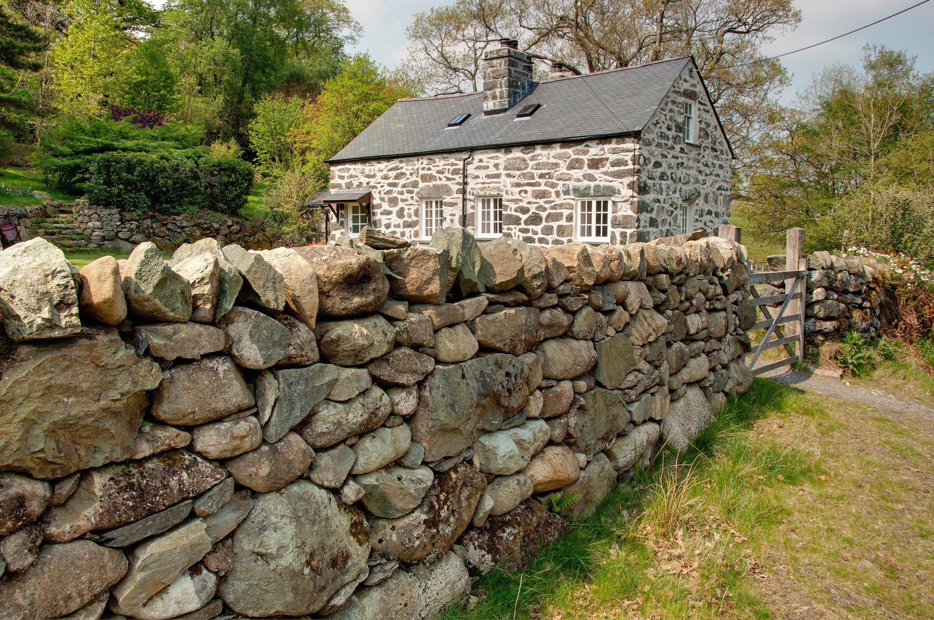 Stone house with wall